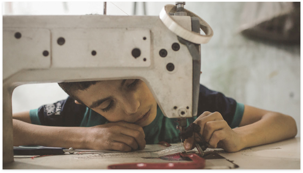 kid working in a factory